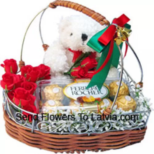 Un bellissimo cesto fatto di rose, 16 pezzi di Ferrero Rocher e un carino orsacchiotto bianco